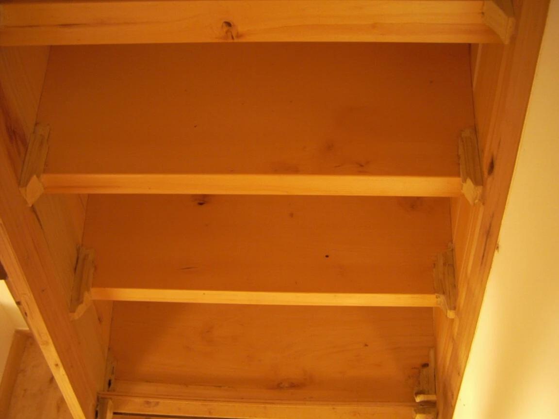 Step 2 of How to Fix a Squeaky Stair: Check whether you can reach the underside